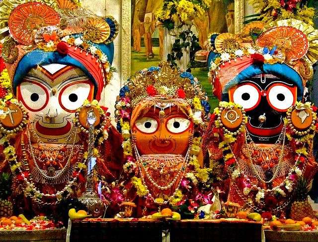 Jagannath, Balabhadra, and Subhadra deities adorned with traditional ornaments inside the Jagannath Temple in Puri