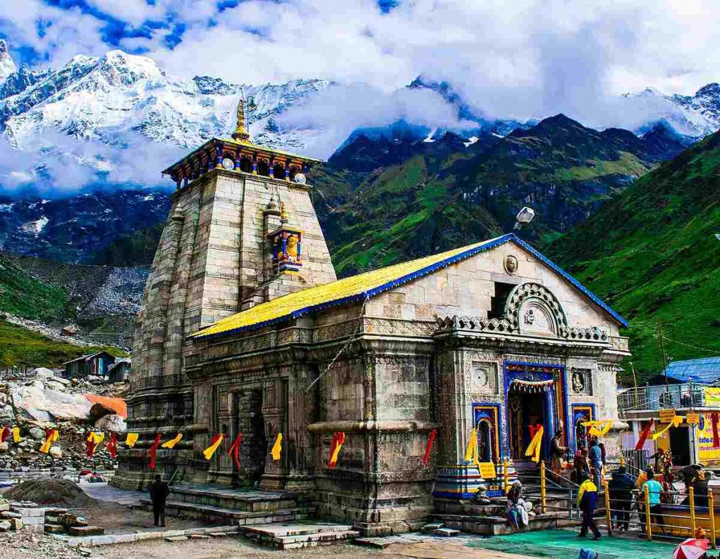 Kedarnath Temple surrounded by snow-covered Himalayan peaks in Uttarakhand