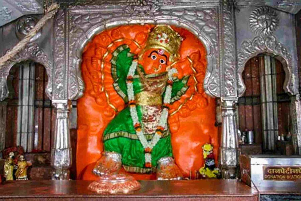 18-armed idol of Goddess Saptashrungi Devi covered in sindoor at Nashik temple