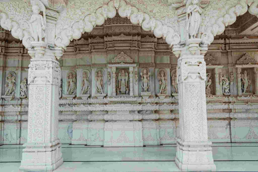 Intricate marble pillars and carvings inside Ambaji Temple Gujarat showcasing traditional temple architecture