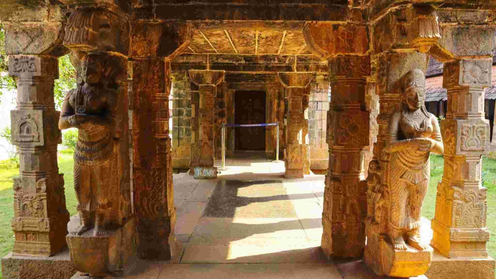 Ancient carved stone pillars inside Padmanabhaswamy Temple corridor in Thiruvananthapuram Kerala