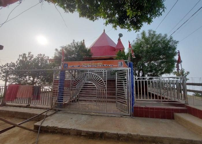 Entrance gate of Chandranath Temple with red dome structure in Sitakunda Bangladesh
