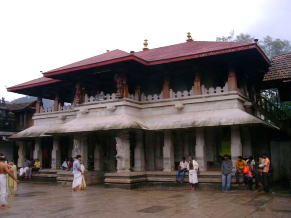 Kollur Mookambika Temple entrance surrounded by lush greenery Karnataka