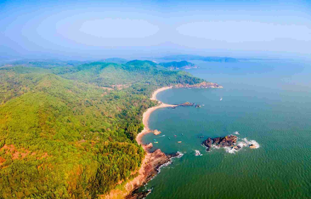 Aerial view of Om Beach Gokarna shaped like Om symbol with coastline
