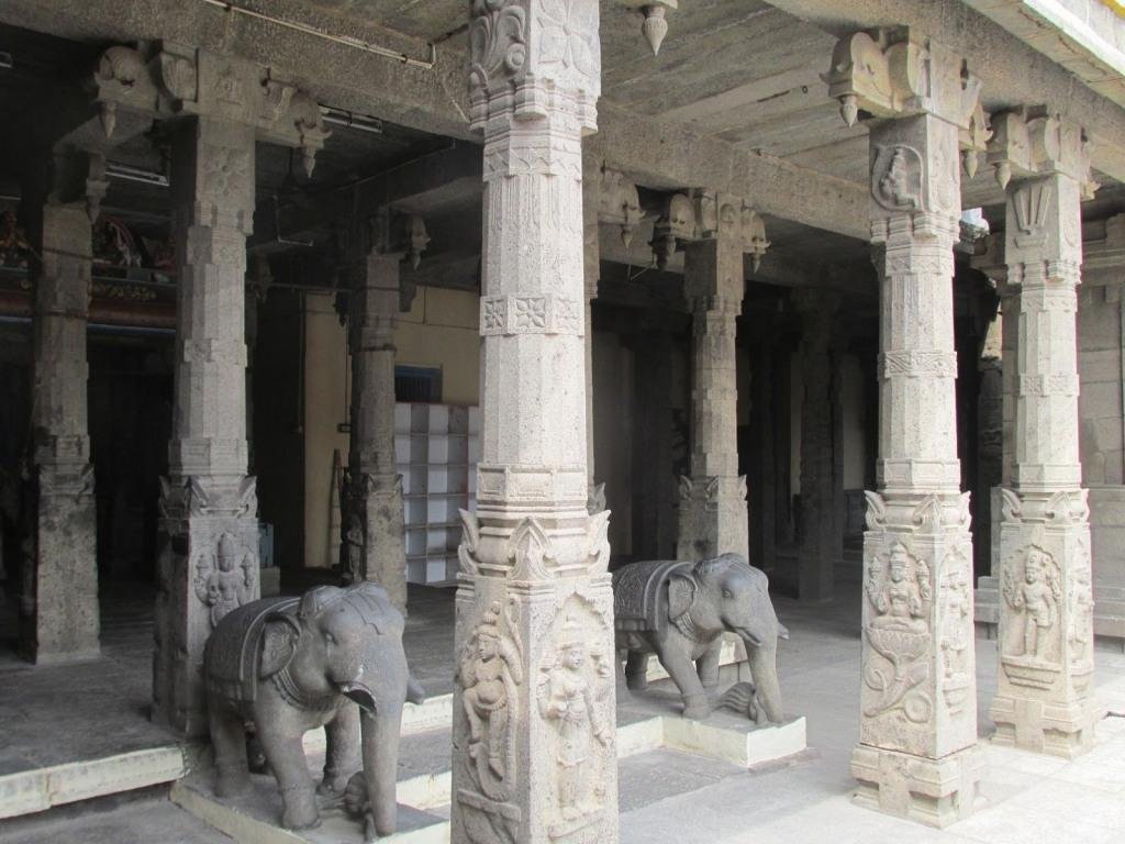 Intricately carved stone pillars and elephant sculptures inside Chennakesava Perumal Temple Chennai