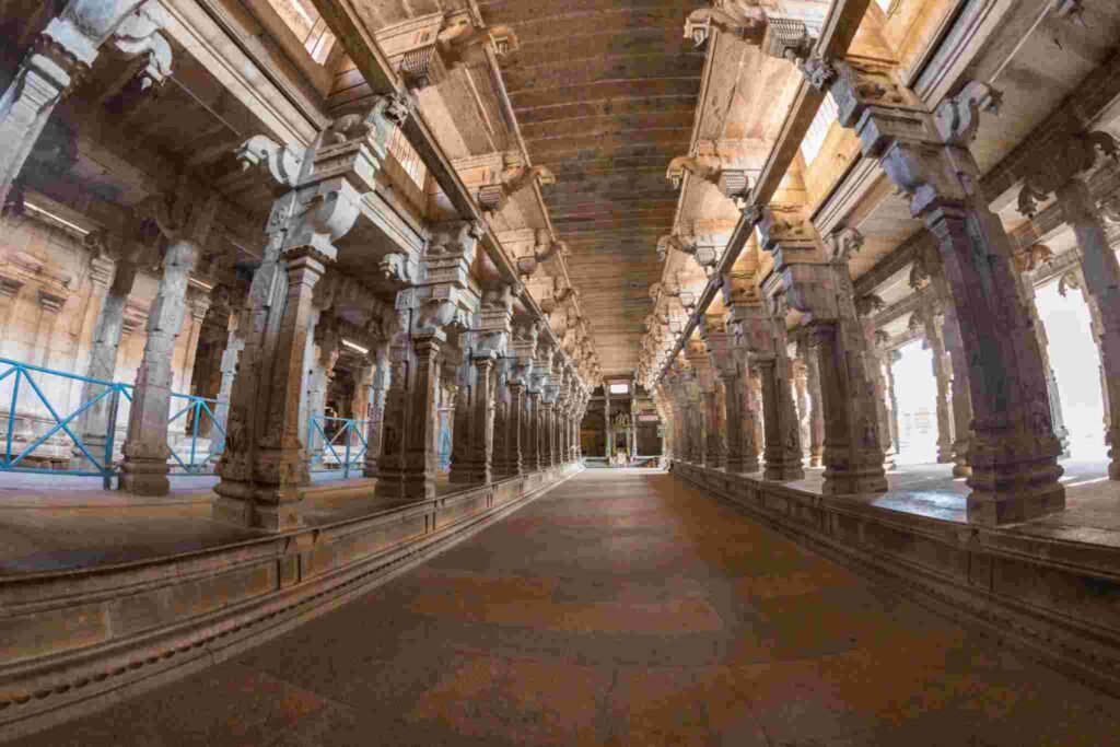 Ancient stone pillar corridor inside Jambukeswarar Temple in Tiruchirapalli Tamil Nadu