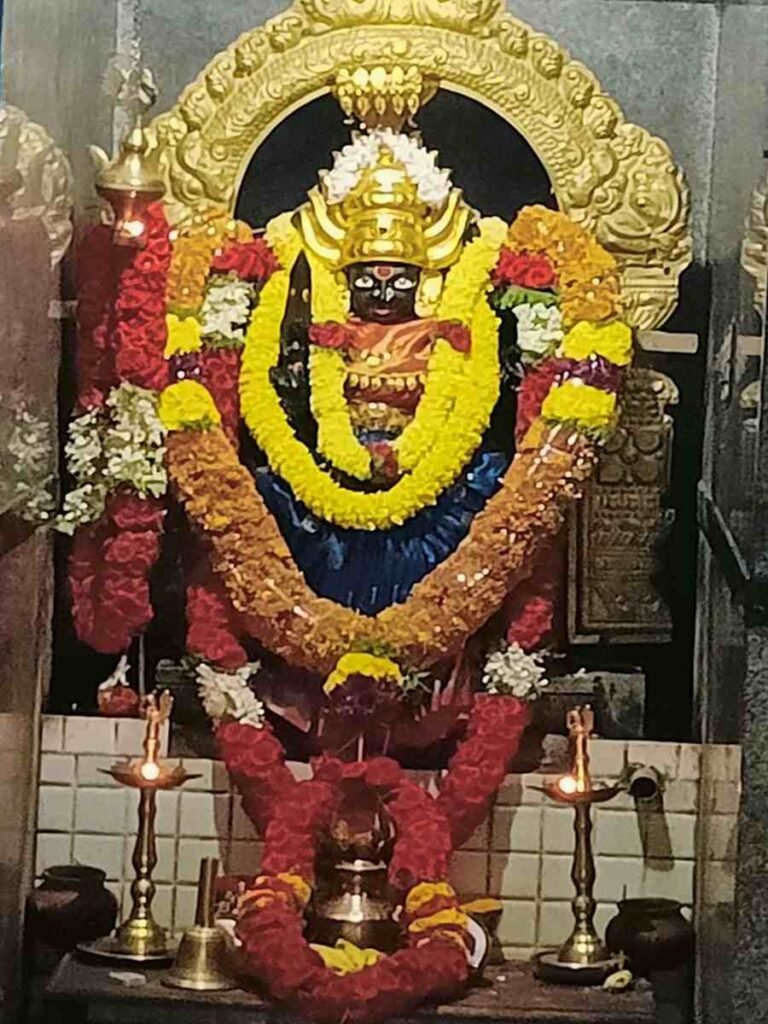 Decorated sacred idol of Goddess Kateramma inside temple sanctum at Hoskote Karnataka.