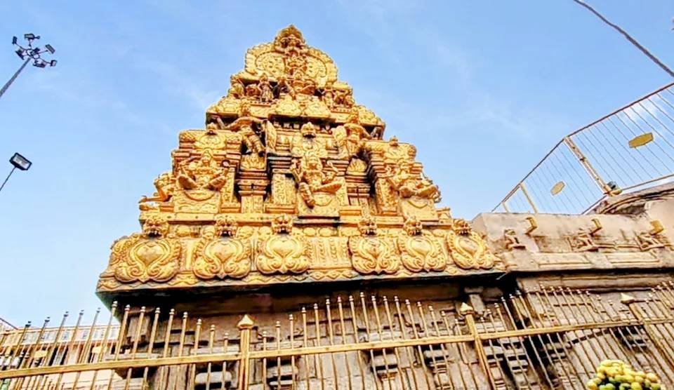 Gold-plated vimana structure above the sanctum of Samayapuram Mariamman Temple in Tamil Nadu