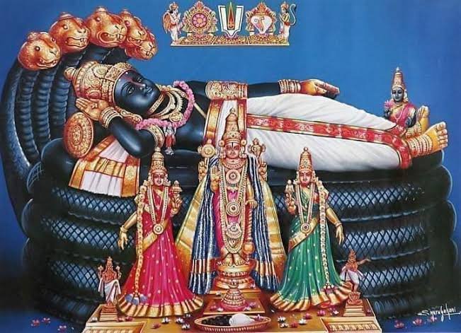 Lord Ranganatha reclining on Adisesha with Goddess Lakshmi and other deities at Sri Ranganatha Swamy Temple, Srirangam.
