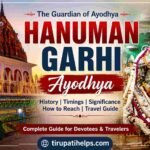 Featured image of Hanuman Garhi Temple in Ayodhya showcasing the illuminated temple, Lord Hanuman idol, Tirupati Helps logo, and complete travel guide information.