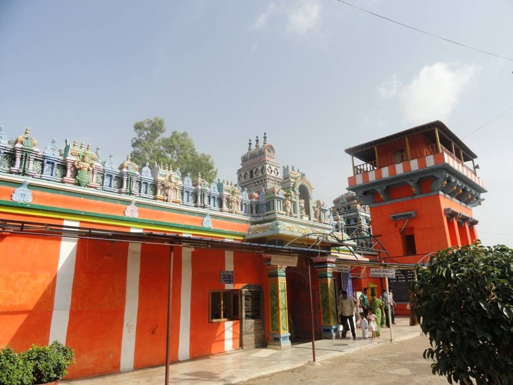 Front view of Karmanghat Hanuman Temple Hyderabad featuring colorful temple architecture and the main entrance.
